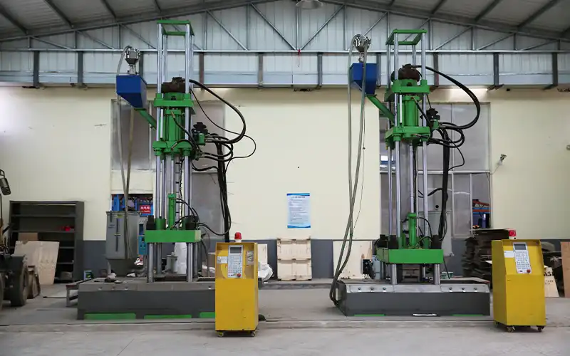Vertical hydraulic molding press at LanDer Fitness factory in Rizhao